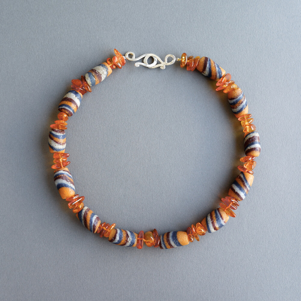 Melanie Decourcey/Amber necklace mixed with African glass beads