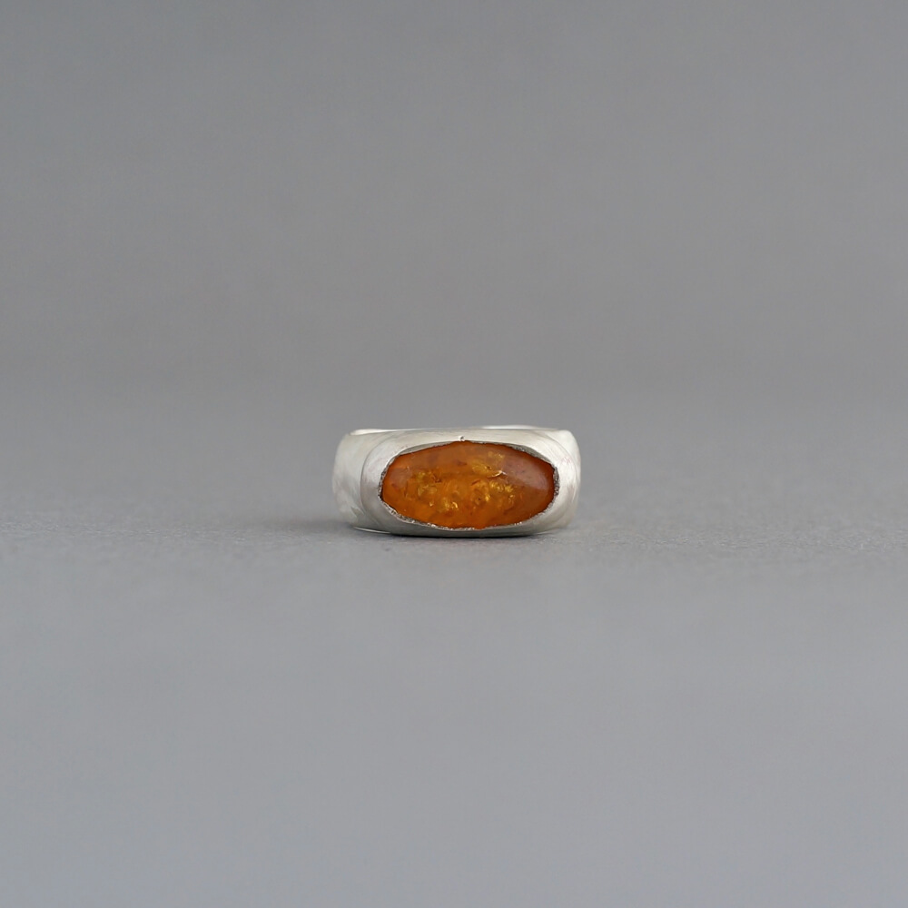 Melanie Decourcey/silver ring with oval amber piece