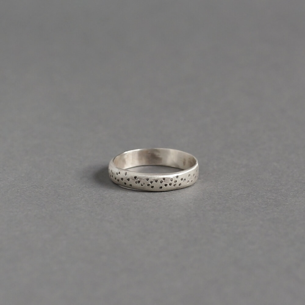 Melanie Decourcey/thick silver ring with dots