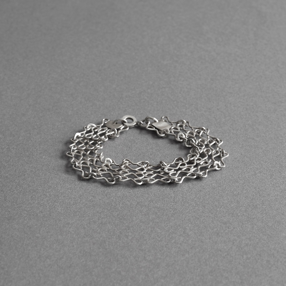 Melanie Decourcey/Lace style silver bracelet