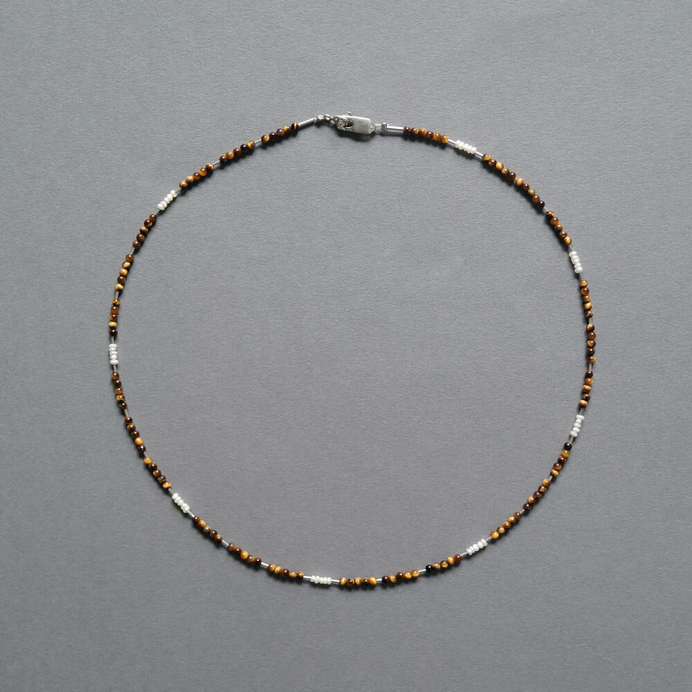 Melanie Decourcey/Beaded Necklace with small tiger eye ,silver parts & pearls