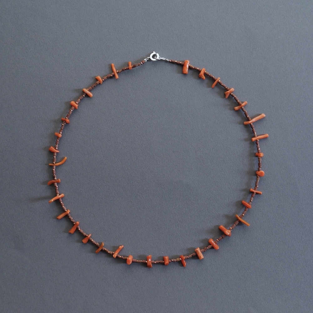Melanie Decourcey/Beaded Necklace/Terra-cotta beads with copper detail & coral