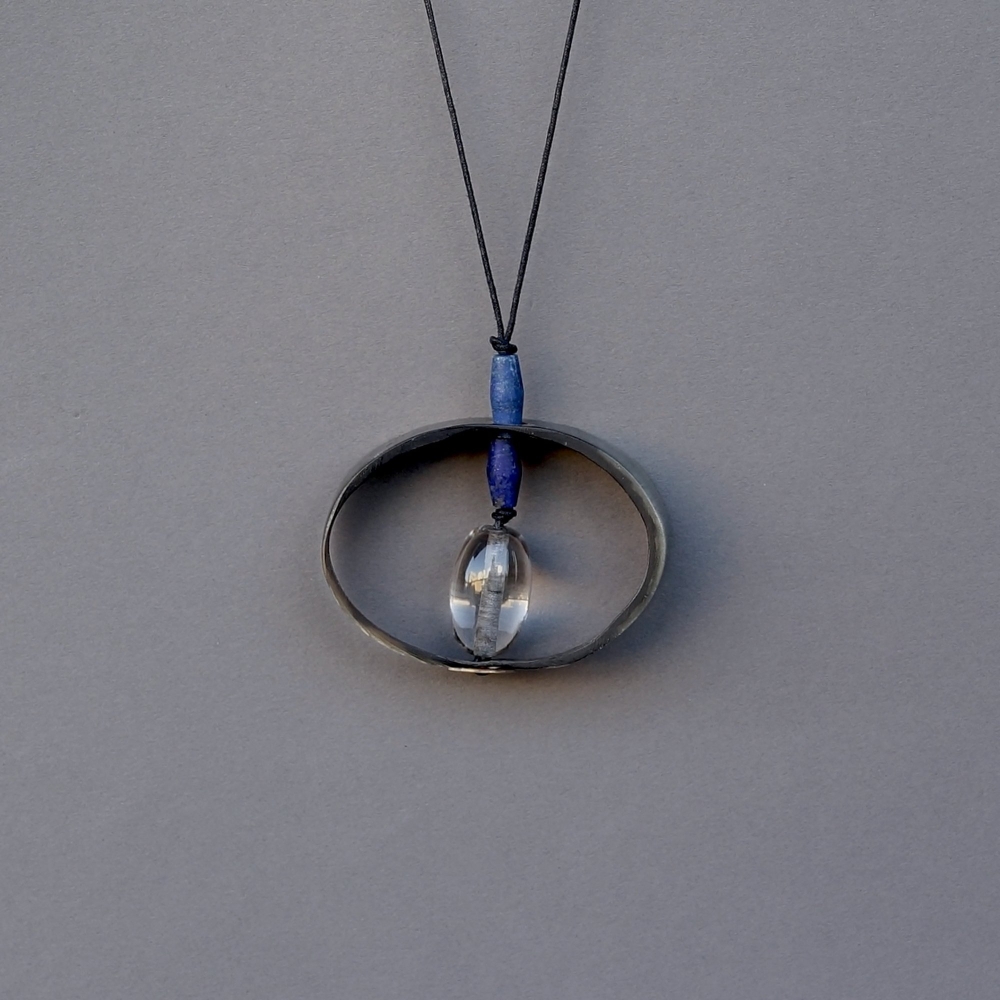 Melanie Decourcey/Horn with crystal & lapis lazuli beads