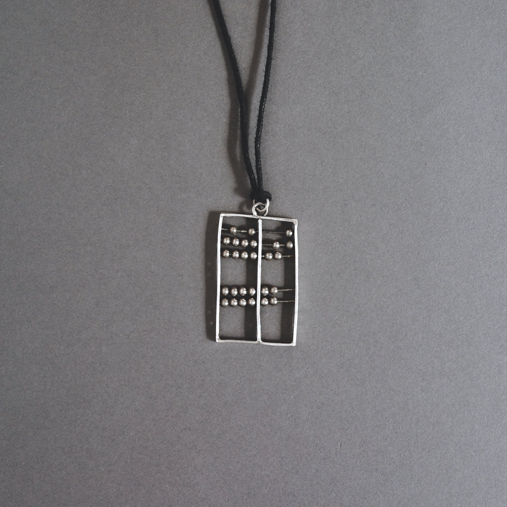 Melanie Decourcey/ pendant on string /silver Abacus pendant