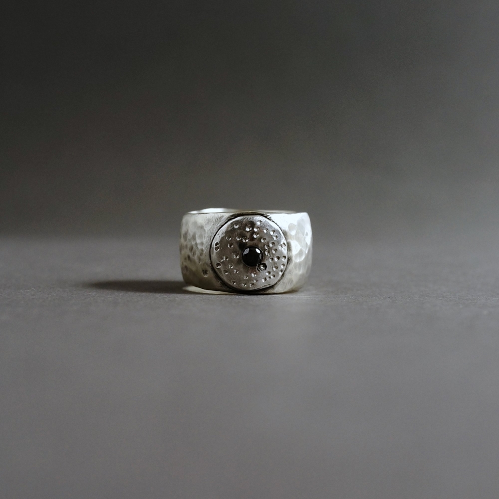 Melanie Decourcey/Silver ring with round center & Black diamond