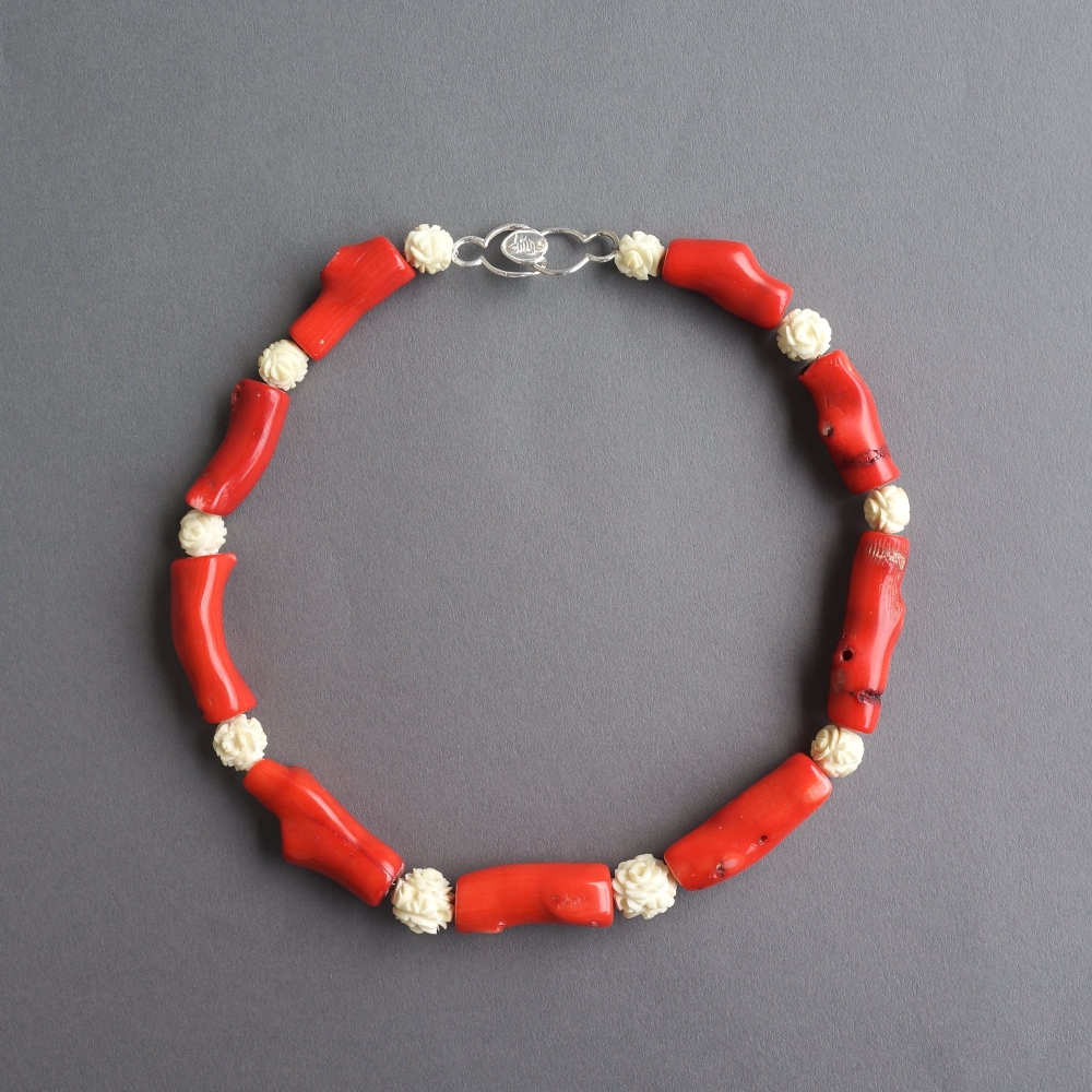 Melanie Decourcey/Beaded Necklace/Dyed Brazilian coral with carved bone roses