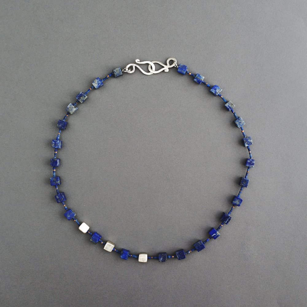 Melanie Decourcey/Beaded Necklace/lapis lazuli cubes with silver squares & small copper detail