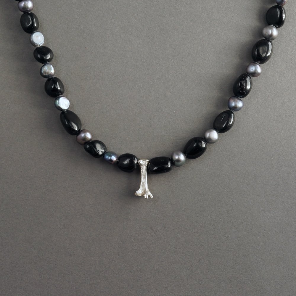 Melanie Decourcey/Beaded Necklace/ Grey pearls with black tormaline & small bone silver pendant 