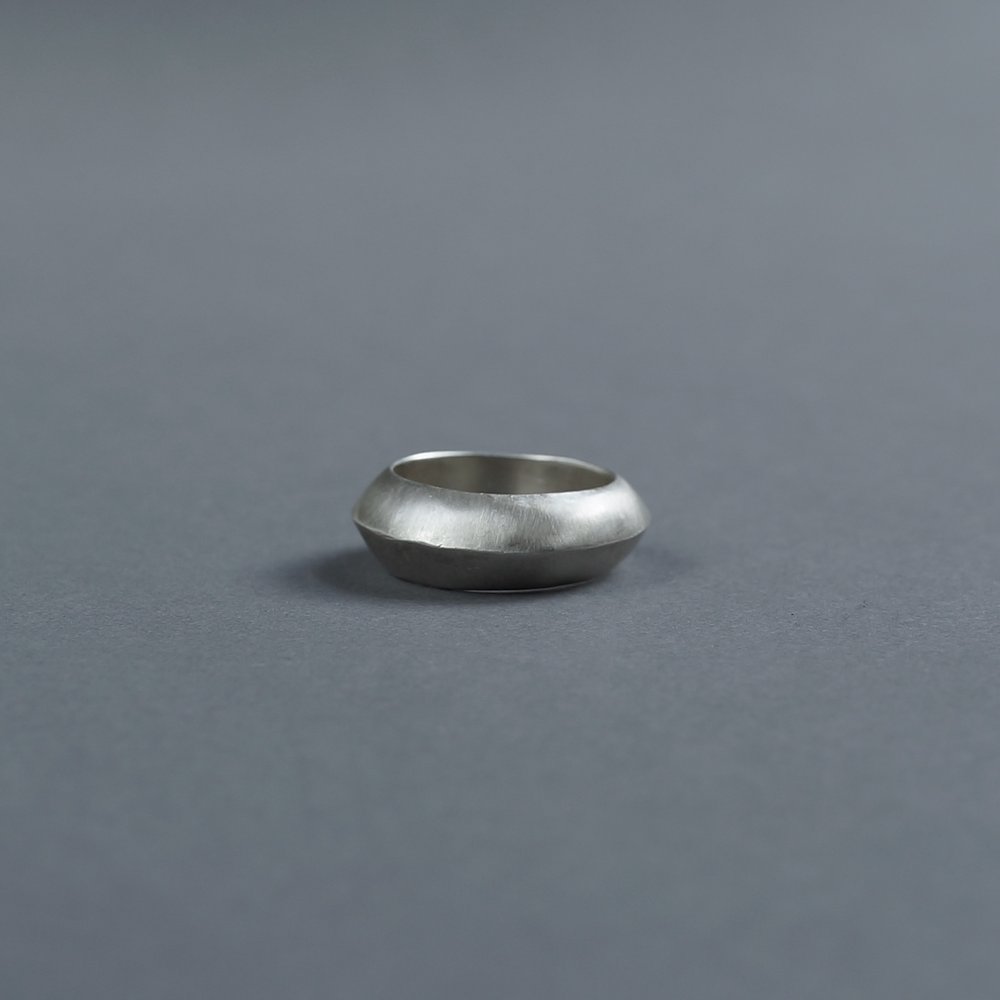 Melanie Decourcey / Wide heavy silver ring tapered outside