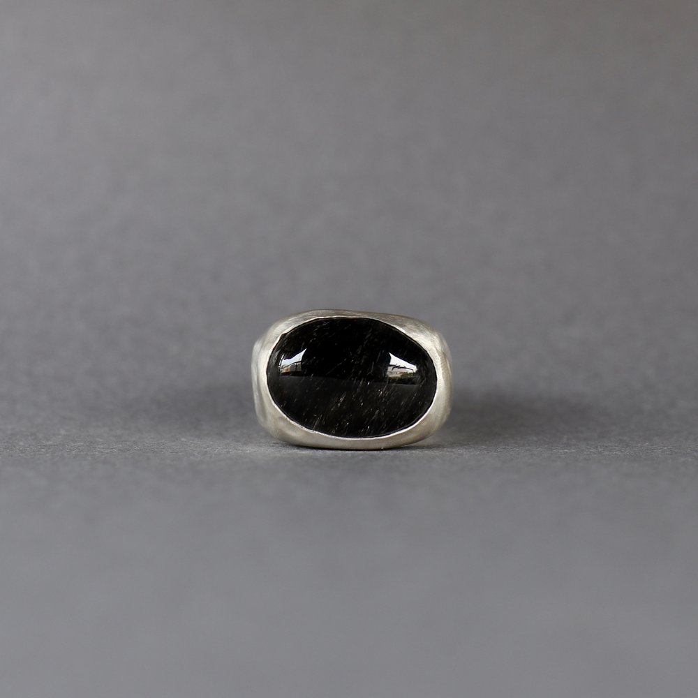 Melanie Decourcey / wide silver ring with rutilated quartz(black lines)