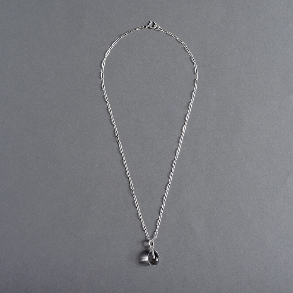 Melanie Decourcey / silver necklace with quartz teadrop pendant
