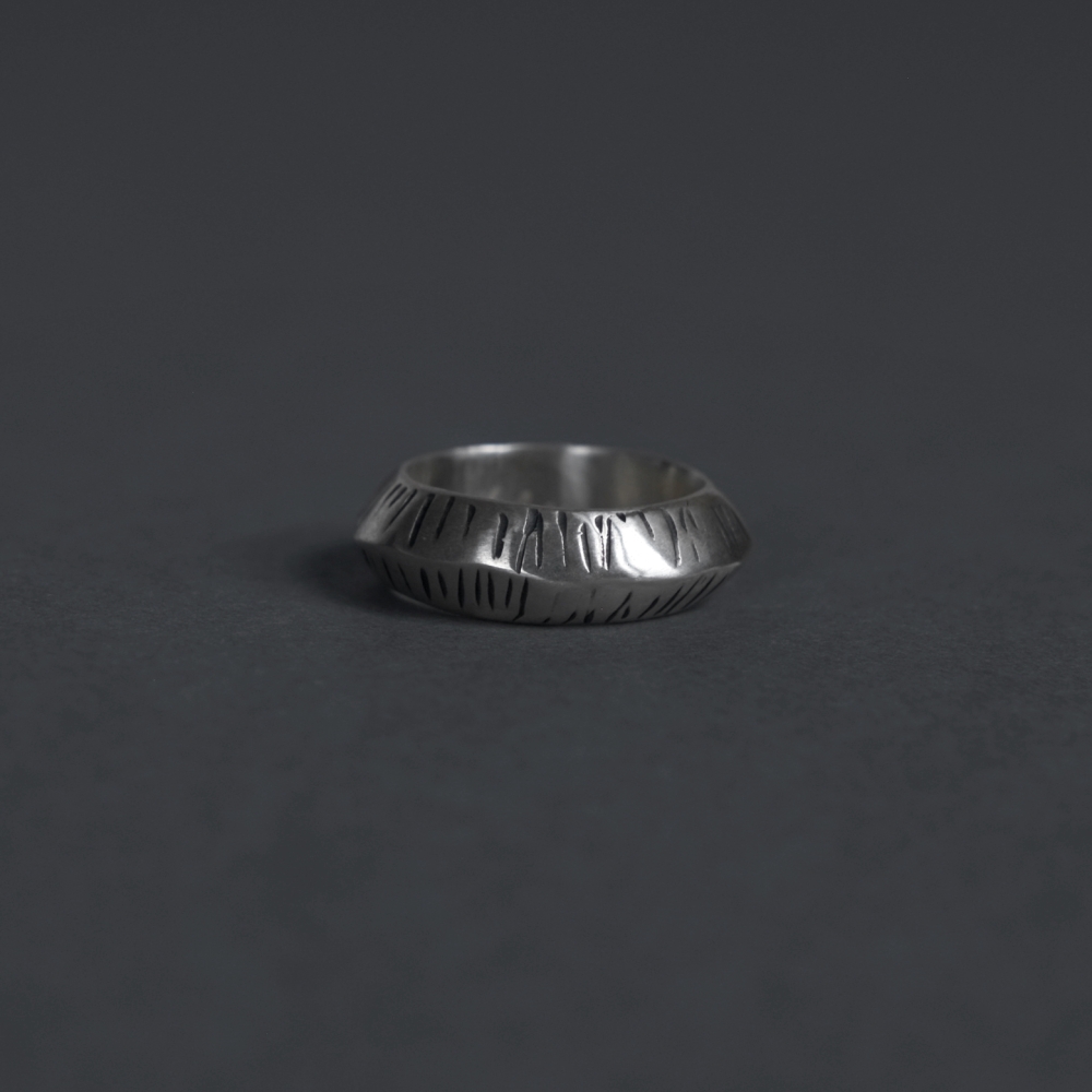 Melanie Decourcey / wide heavy silver ring tapered with free style line