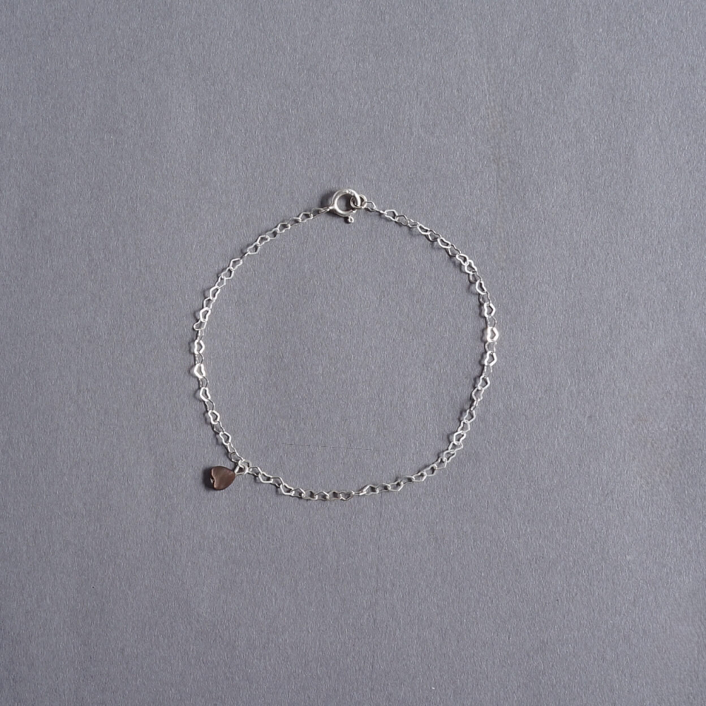 Melanie Decourcey / heart shape silver bracelet with tiny mother of pearl heart