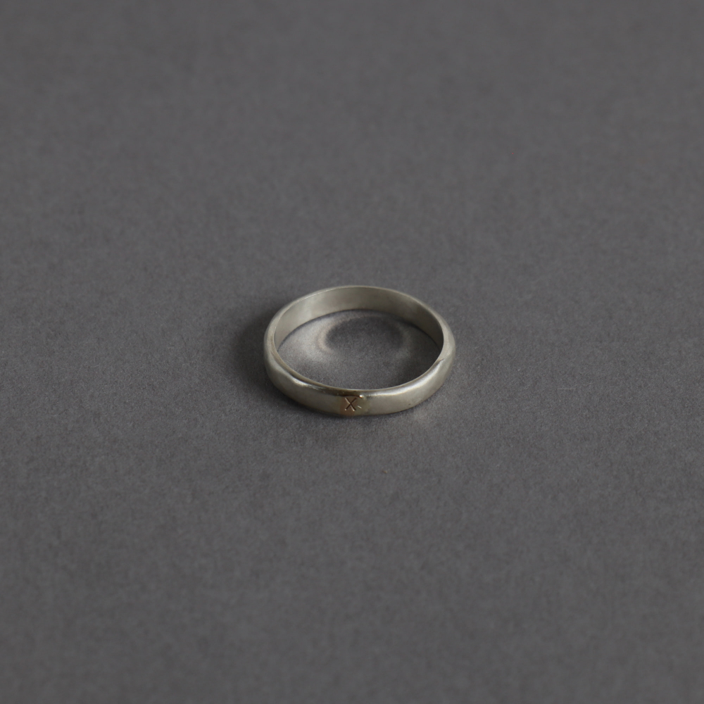 Melanie Decourcey / silver ring with gold detail and X