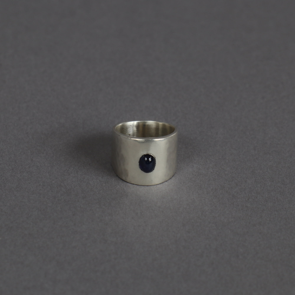 Melanie Decourcey / wide silver ring with oval sapphire