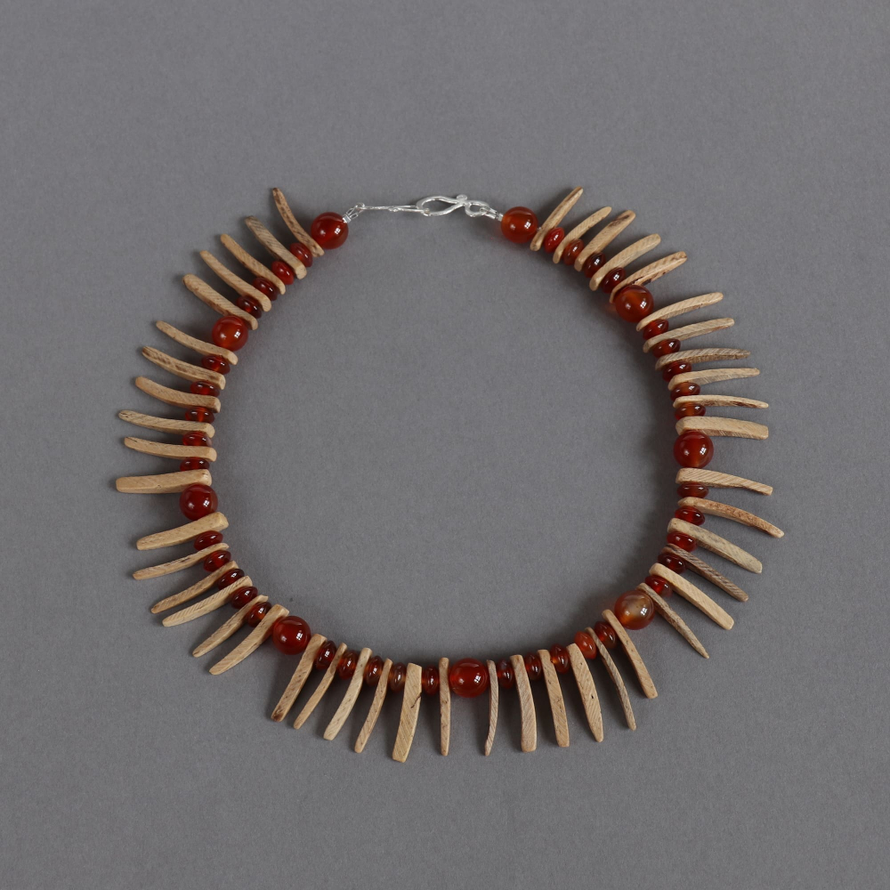 Melanie Decourcey / Beaded Necklace / coconut wood alternating with garnet beads