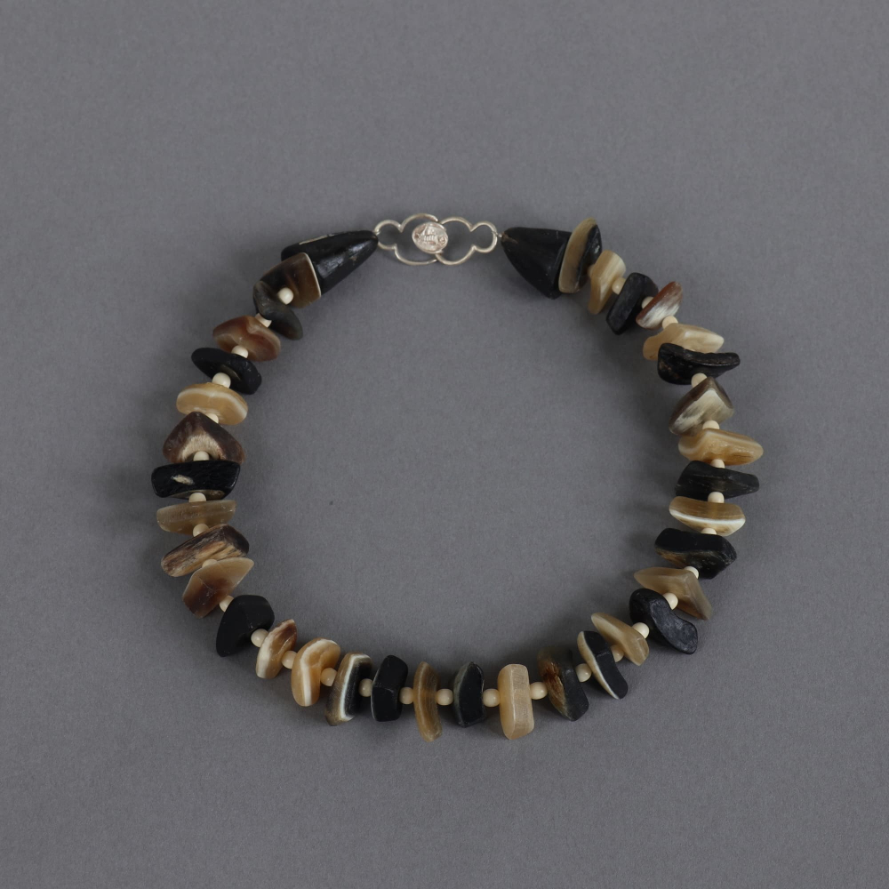Melanie Decourcey / Beaded Necklace / free shape horn parts alternating,round ivory color bone parts