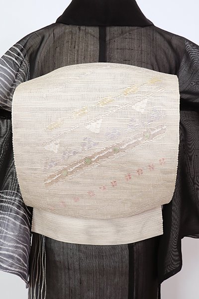 あおき【K-8416】西陣 都製 手織り櫛織 名古屋帯 薄卵色 抽象文（証紙付）