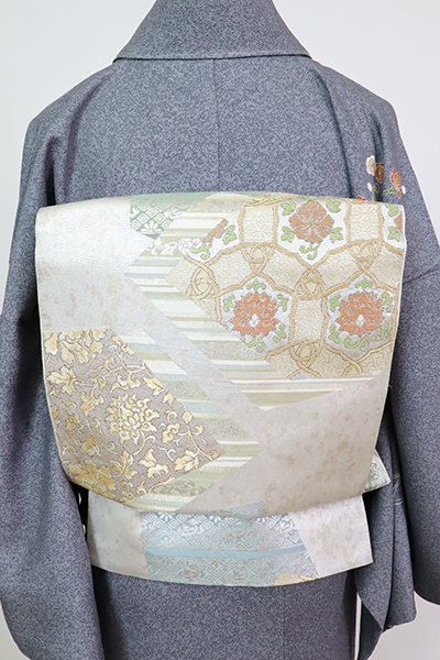 銀座【L-6508】西陣 川島織物製 本袋帯 銀色 裂取りに名物裂文など（落款入）
