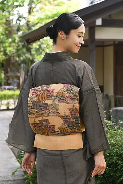 あおき【帯5687】城間栄順作 芭蕉布地 本紅型名古屋帯（落款入）