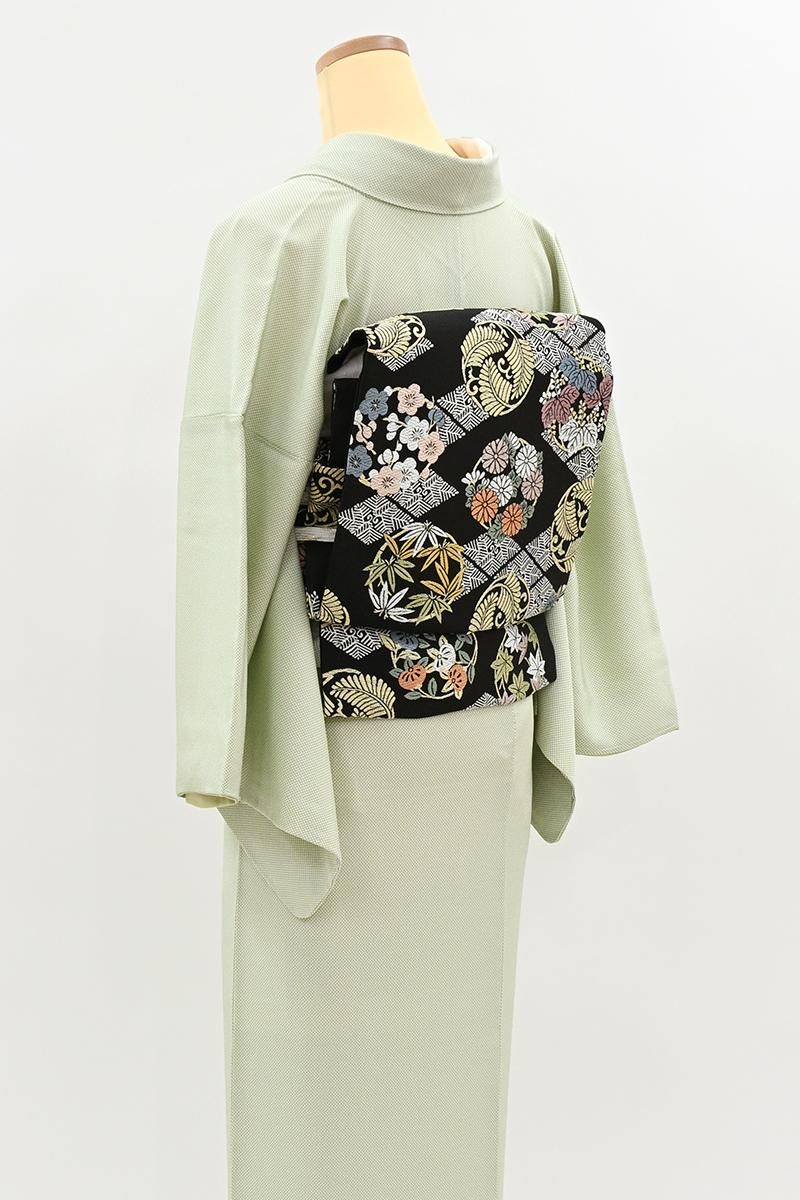 素敵な装い！西陣全通名古屋帯 丸巻き　モダン幾何学　薄青鼠 銀座【H-0815】西陣製 織名古屋帯 黒色 四季花の丸（証紙付）（N