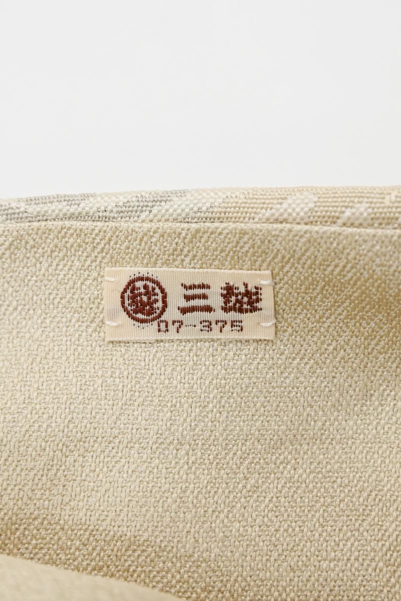 銀座【H-0827】雪間乃草 織名古屋帯 鳥の子色×灰色 横段に唐花文（落款