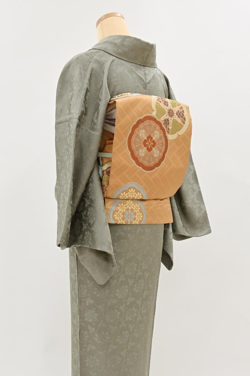 銀座【H-0864】西陣 川島織物製 開き織名古屋帯 杏色 六つ瓜文（落款入