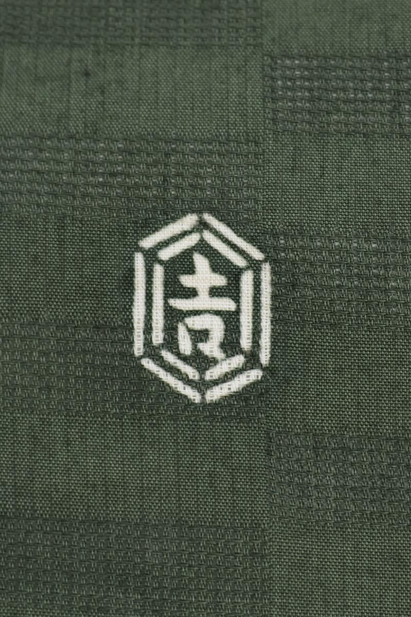 銀座【H-1200】栗山工房製 絽麻地 型染 名古屋帯 白橡色 網干波の図