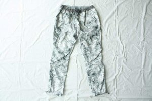 and wander アンドワンダー　white forest printed pants