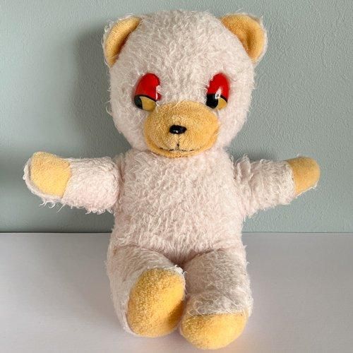 東ドイツ ヴィンテージのぬいぐるみ ピンク色の横目のクマ