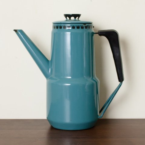 teal colored tea kettle