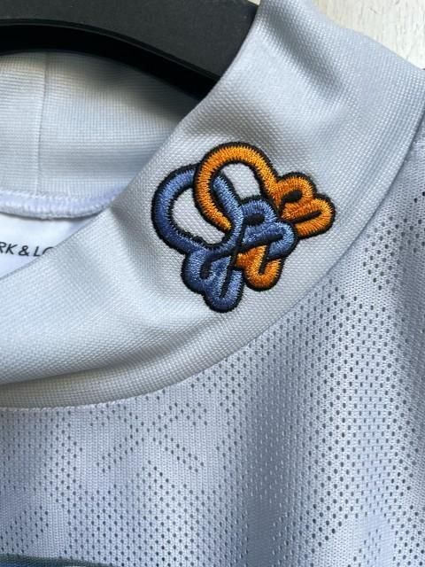 MARK&LONA マーク＆ロナClava Mesh Jacquard Mock Neck off white MLM