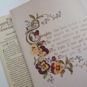 オランダ 淡いお花柄で彩られた古い絵本❁洋書 ドール アンティーク　ビンテージ Mikuni Bisque Doll 商品カタログ